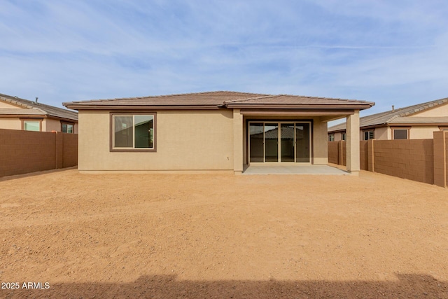 rear view of house with a patio area