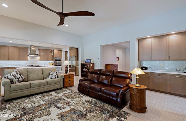 living room featuring ceiling fan