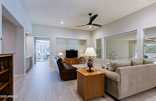 living room featuring ceiling fan