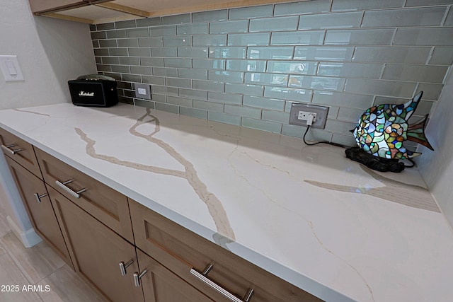 bathroom featuring tasteful backsplash