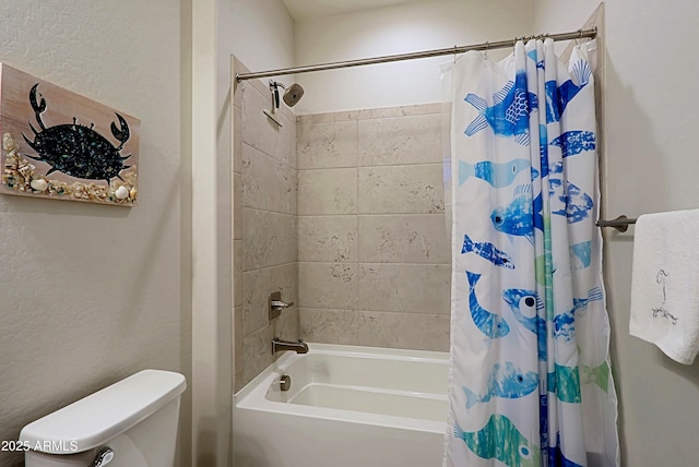 bathroom with toilet and shower / bath combo with shower curtain