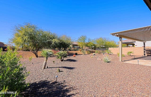 view of yard with a pergola