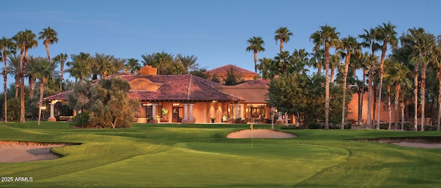 view of front of home featuring a gazebo and a front yard