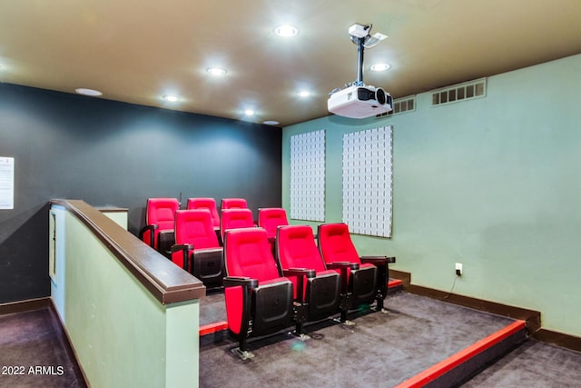 cinema room featuring baseboards, visible vents, dark colored carpet, and recessed lighting