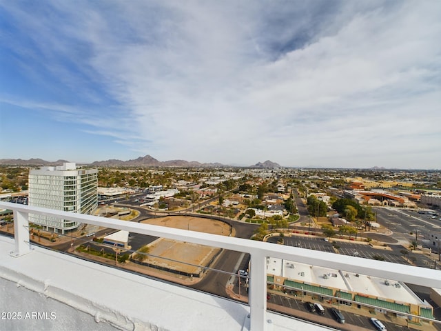 birds eye view of property featuring a view of city and a mountain view