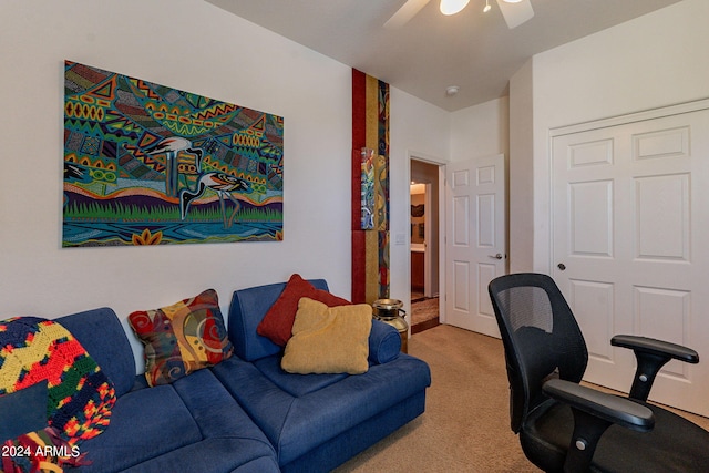 home office with ceiling fan and carpet floors