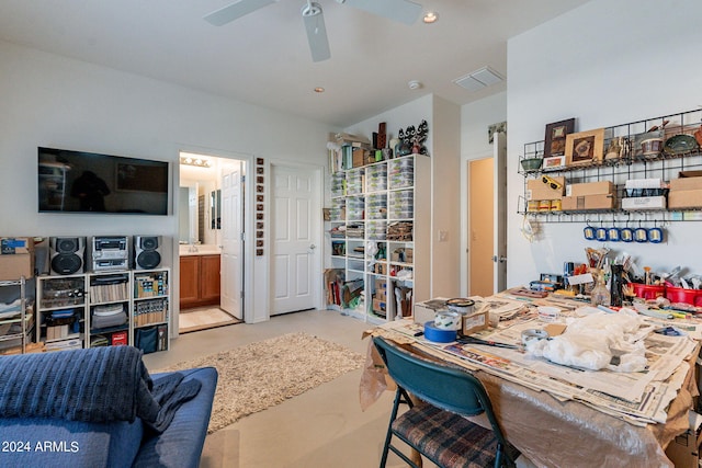 interior space with ceiling fan