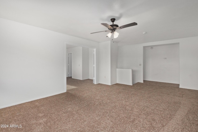 carpeted empty room with ceiling fan