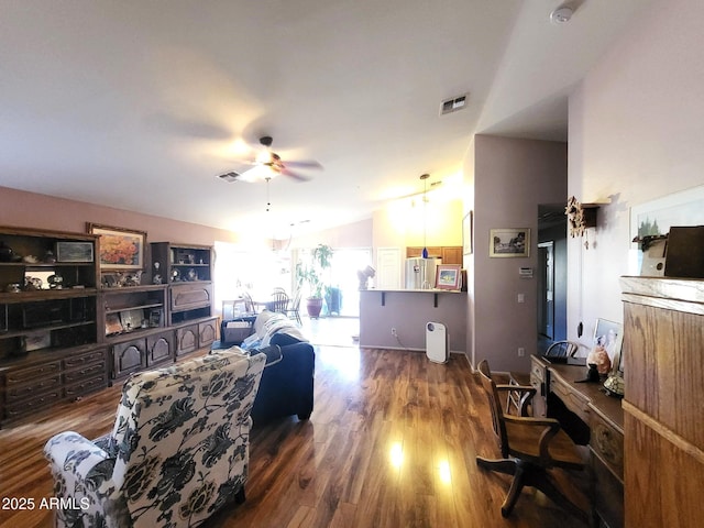 17257 W Papago St, Goodyear, AZ 85338 - living room featuring a ceiling fan, wood finished floors, and lofted ceiling