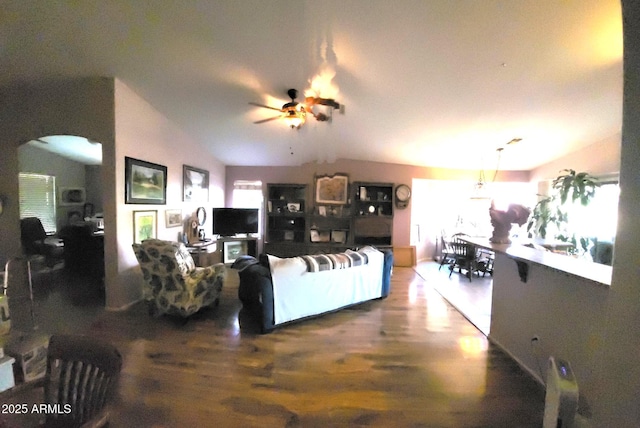 17257 W Papago St, Goodyear, AZ 85338 - living area with a ceiling fan, arched walkways, and wood finished floors