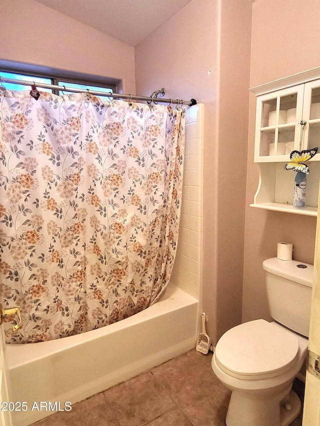 17257 W Papago St, Goodyear, AZ 85338 - bathroom featuring vaulted ceiling, shower / bath combo, and tile patterned flooring