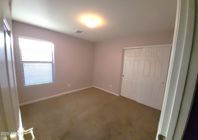 17257 W Papago St, Goodyear, AZ 85338 - unfurnished bedroom with carpet floors and a closet