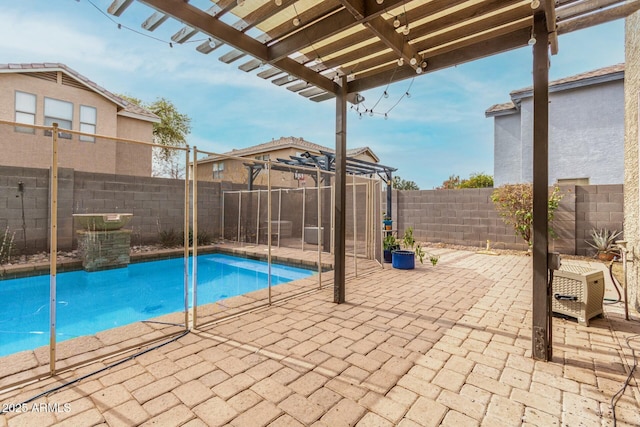 view of pool featuring a patio area and a pergola