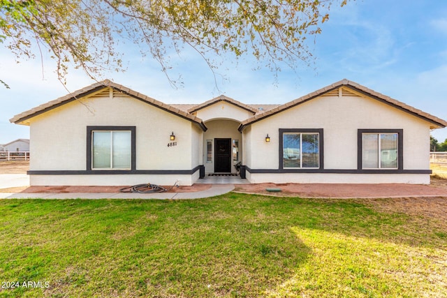 view of front of home with a front yard