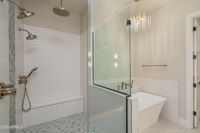 bathroom with tile patterned flooring and plus walk in shower