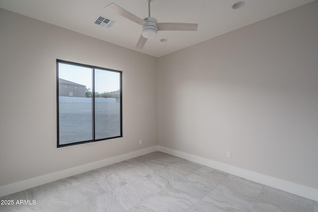 empty room featuring ceiling fan