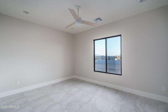 spare room featuring ceiling fan