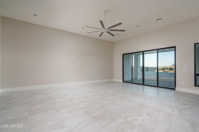 unfurnished room featuring ceiling fan