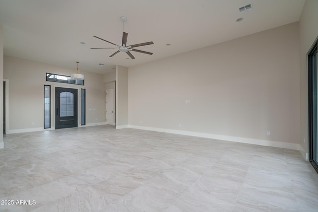 unfurnished living room featuring ceiling fan