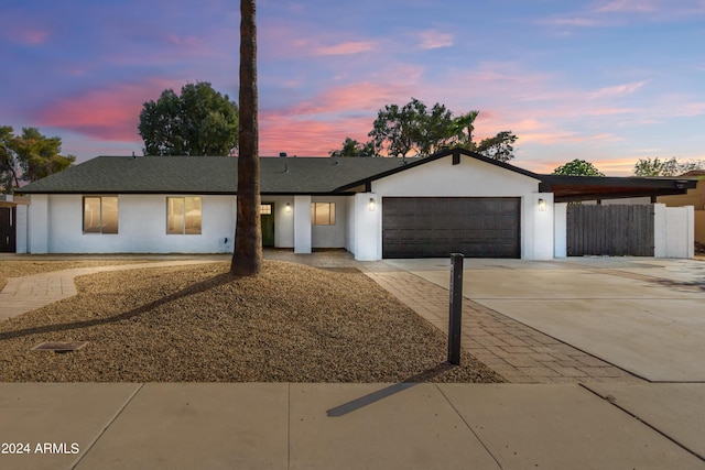 view of front of home with a garage