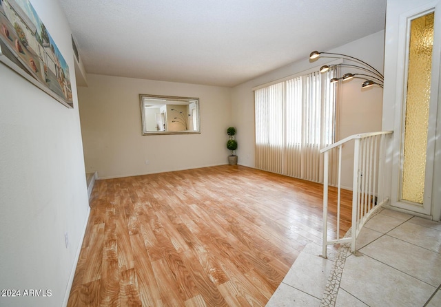 unfurnished room featuring light wood-type flooring