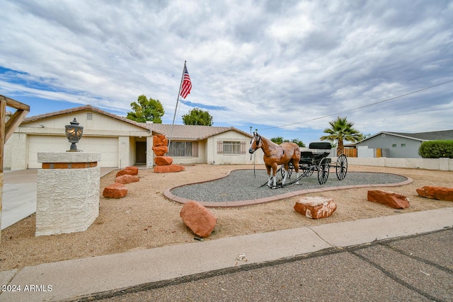 view of front of home with a garage