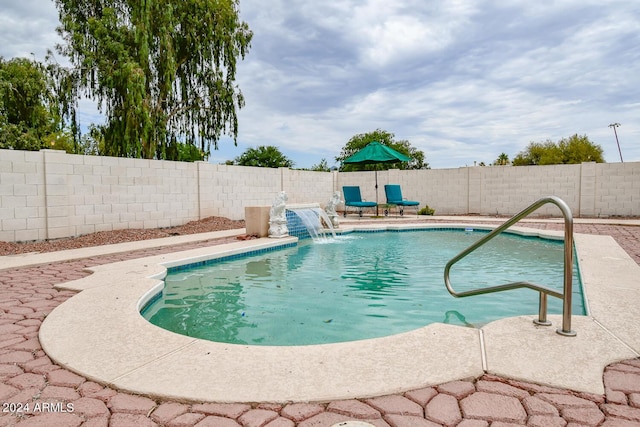 view of pool featuring a patio