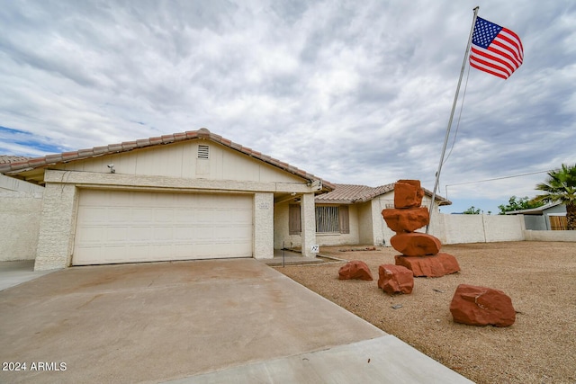 view of front of property with a garage