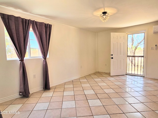 1374 S Naco Hwy, Bisbee, AZ 85603 - unfurnished room featuring light tile patterned floors, ornamental molding, baseboards, and an AC wall unit