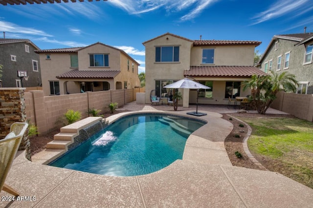 view of pool featuring a patio area and pool water feature