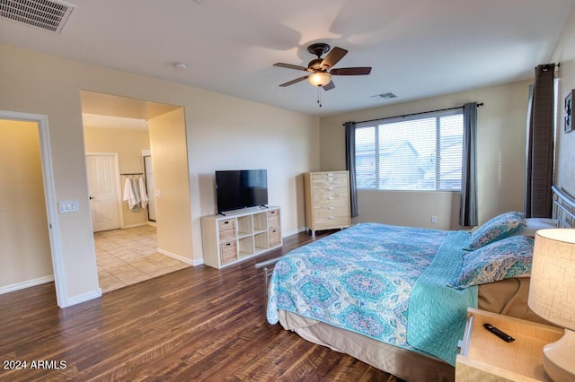 bedroom featuring hardwood / wood-style flooring and ceiling fan