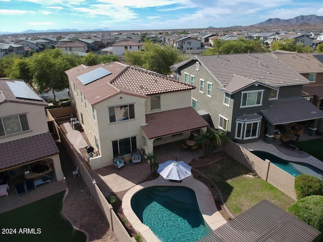 drone / aerial view featuring a mountain view