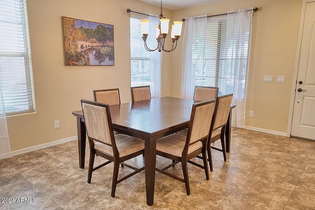 dining room with a chandelier