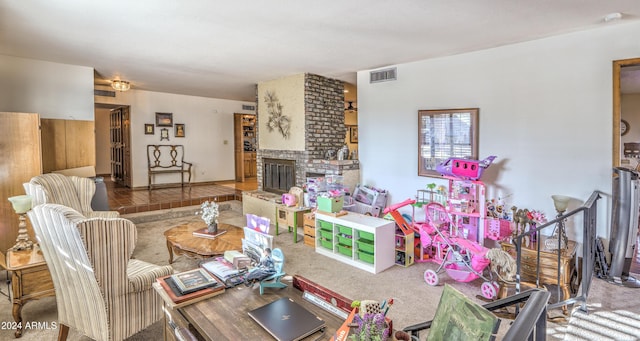 carpeted living room featuring a brick fireplace