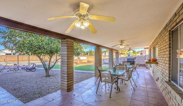 view of patio with ceiling fan