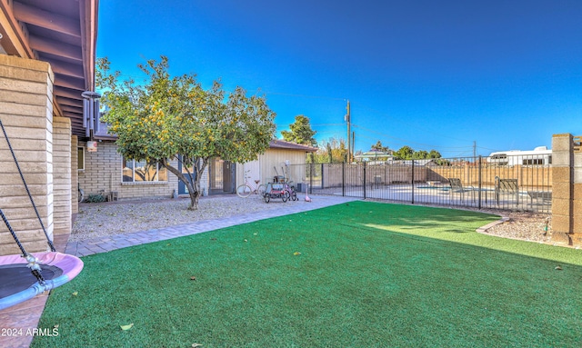 view of yard with a patio area and a trampoline