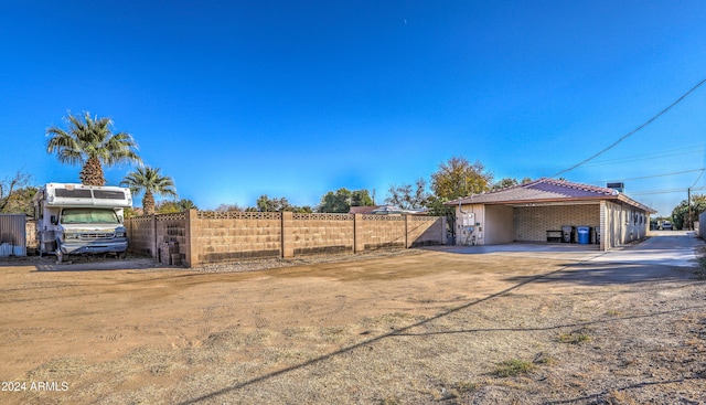 view of yard with a carport