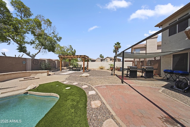 13160 W Windsor Ave, Goodyear, AZ 85395 - fenced backyard featuring a pergola, a patio, and a putting green