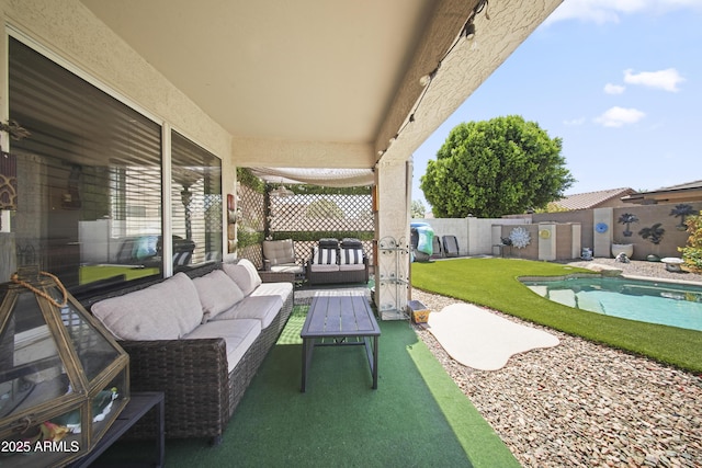 13160 W Windsor Ave, Goodyear, AZ 85395 - fenced backyard with outdoor lounge area and a patio area
