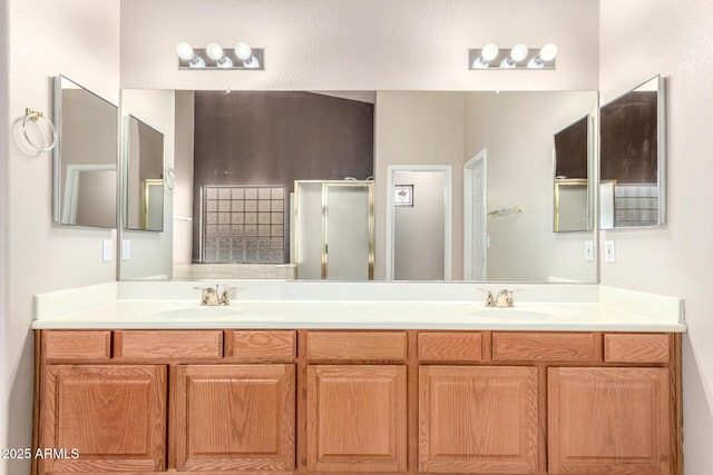 bathroom with vanity and walk in shower