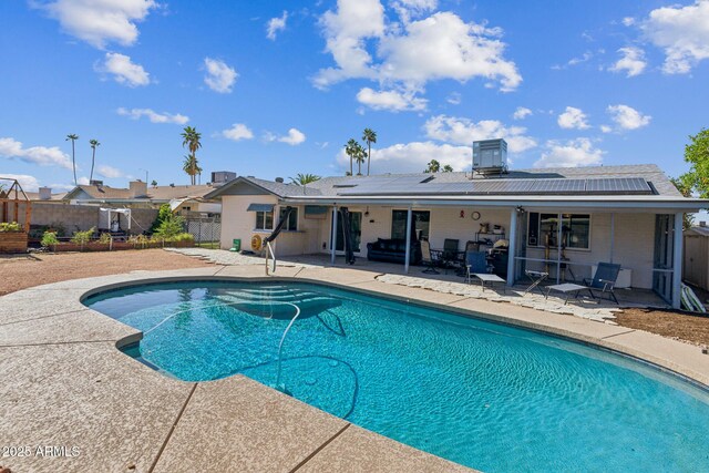 3833 W Phelps Rd, Phoenix, AZ 85053 - view of pool with a patio, a fenced backyard, and central AC unit