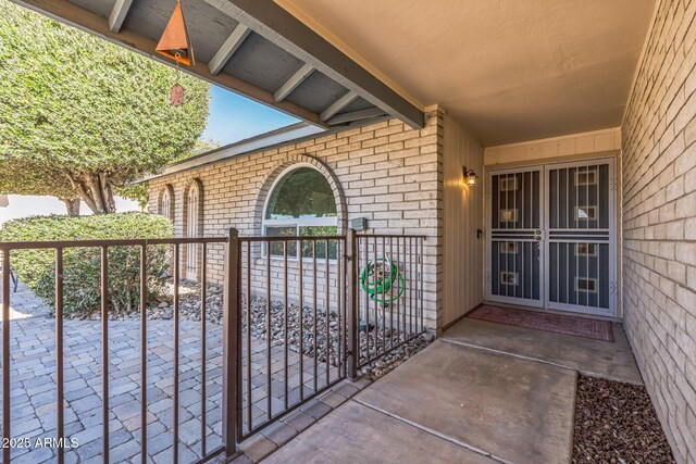 3833 W Phelps Rd, Phoenix, AZ 85053 - view of exterior entry featuring brick siding