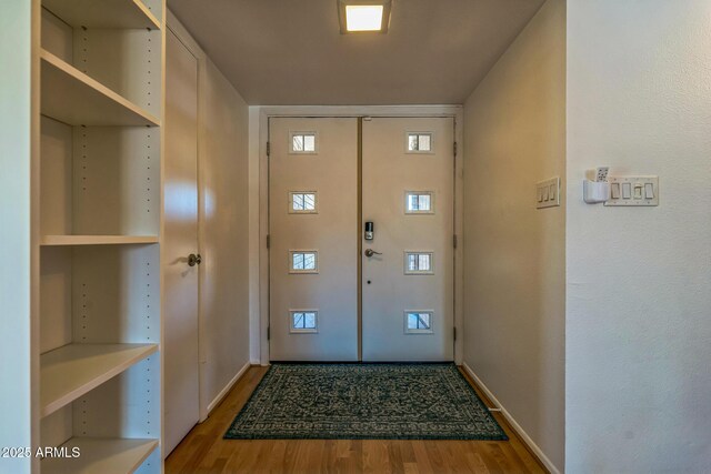 3833 W Phelps Rd, Phoenix, AZ 85053 - foyer featuring wood finished floors and baseboards