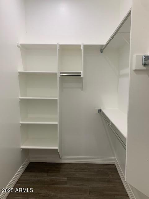 2319 N 192nd Ave, Buckeye, AZ 85396 - spacious closet featuring dark wood-style floors