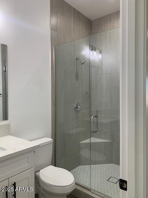 2319 N 192nd Ave, Buckeye, AZ 85396 - full bath featuring a stall shower, toilet, and vanity
