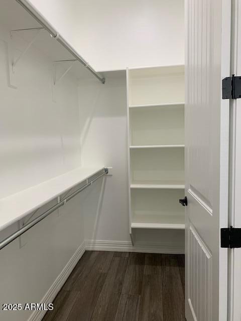 2319 N 192nd Ave, Buckeye, AZ 85396 - spacious closet with dark wood-style floors