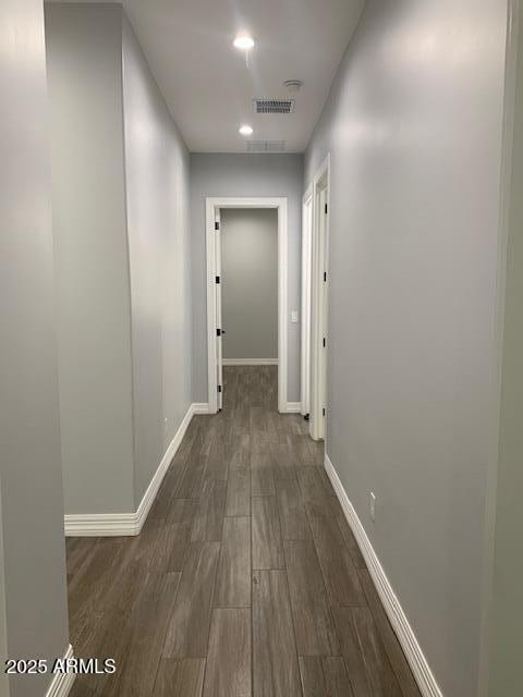 2319 N 192nd Ave, Buckeye, AZ 85396 - corridor with baseboards, visible vents, recessed lighting, and dark wood-style flooring