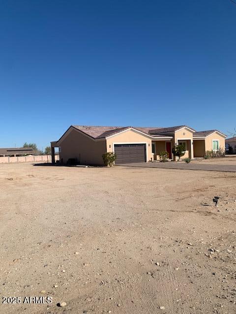 2319 N 192nd Ave, Buckeye, AZ 85396 - ranch-style home featuring an attached garage