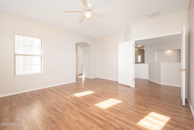 unfurnished room featuring ceiling fan and wood-type flooring