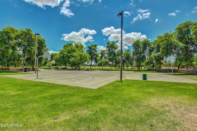 view of sport court with community basketball court and a yard